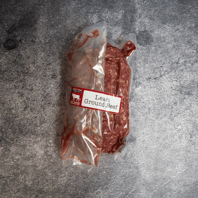 Lean ground beef portion in vacuum-sealed packaging.
