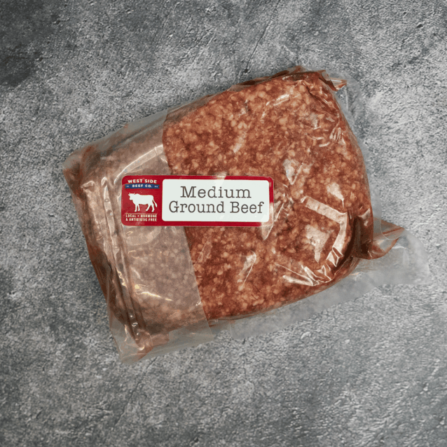 Medium ground beef portion in vacuum-sealed packaging.