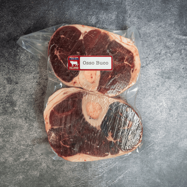 Osso buco beef shank cuts with marrow bones, vacuum-sealed in packaging.