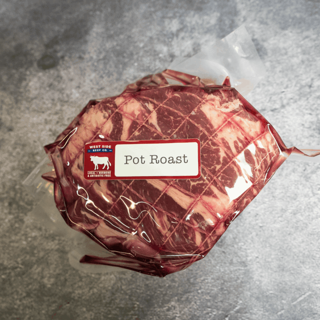 Beef pot roast wrapped and vacuum-sealed with label.