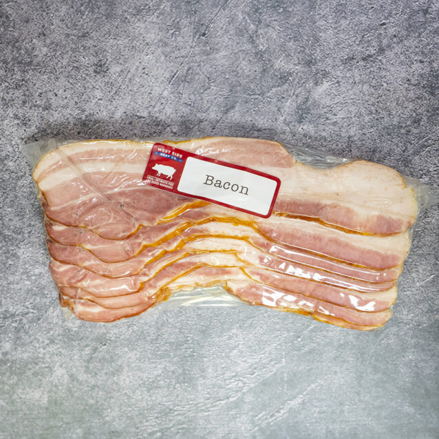 Sliced pork bacon vacuum sealed in plastic packaging.